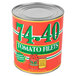A case of 6 Stanislaus #10 cans of tomato filets with the words "74-40" on the label.