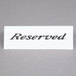 An American Metalcraft white plastic table tent sign with the word "Reserved" on it.