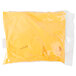 A clear plastic bag of yellow Gehl's Jalapeno Cheese Sauce.