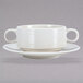 A white porcelain soup bowl with two handles.