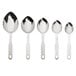 A group of Thunder Group stainless steel measuring spoons with white handles.