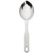A silver stainless steel measuring spoon with a white handle.
