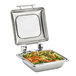 A Vollrath stainless steel square chafing dish with vegetables in a container.