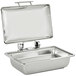A silver rectangular Vollrath induction chafer with a stainless steel lid.