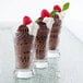 A group of Libbey Flare Shooter Glasses filled with chocolate mousse and raspberries.