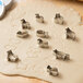 Ateco stainless steel animal cookie cutter set on dough.
