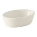 A Tuxton eggshell oval china baker bowl in white.