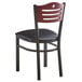 A Lancaster Table & Seating black bistro chair with a black vinyl seat and mahogany wood back.