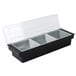 A black and white plastic Choice 3-Compartment Condiment Bar on a counter.