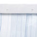 A close-up of a white strip door curtain with blue stripes.
