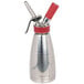 A stainless steel cream decorator tip with a red plastic cap.