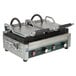 A Waring panini sandwich grill with two grooved and two smooth plates.