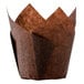 A close-up of a brown paper Hoffmaster tulip baking cup with a folded edge.