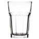 A close up of a Libbey Gibraltar clear beverage glass with a clear bottom.