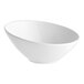 An Acopa bright white porcelain bowl with a slanted edge on a white background.