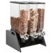 A Rosseto triple cereal dispenser filled with nuts.