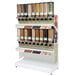 A Rosseto free standing cereal dispenser rack filled with various types of grains.
