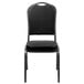 A black Flash Furniture banquet chair with a black vinyl seat and silver vein frame.