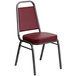 A red Flash Furniture banquet chair with metal legs and a silver vein frame.