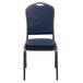 A Flash Furniture Hercules navy blue vinyl banquet chair with a silver frame and black back.