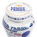 A white Fabbri jar of Amarena cherries with blue and white text.