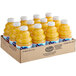 A cardboard box filled with yellow Ocean Spray 32 fl. oz. bottles of orange juice.