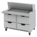 A white refrigerated sandwich prep table with drawers.