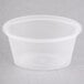 A clear Newspring oval souffle container with a clear lid.