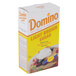 A box of Domino Light Brown Sugar.