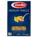 A spoonful of Barilla medium shells pasta.