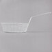 A white wire breading basket with a long handle.