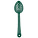A green Thunder Group polycarbonate salad bar spoon with perforations.