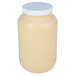 A white plastic container of Ken's Foods Golden Honey Mustard Dressing with a white lid.