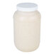 A white jar of Ken's Foods Honey Mustard Dressing with a white lid.