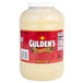 A jar of Gulden's Spicy Brown Mustard on a white background.