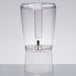 A clear plastic Choice beverage dispenser with a spout and a vertical ice core.