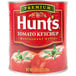 A can of Hunt's premium tomato ketchup.