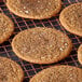 David's Cookies classic ginger molasses cookie on a cooling rack.