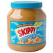 A 4 lb. jar of Skippy creamy peanut butter.