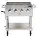 A stainless steel Backyard Pro grill cooking grate on a gas grill.