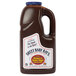 A jug of Sweet Baby Ray's BBQ Sauce with a label and handle.