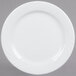 A Tuxton Sonoma bright white china plate with swirls on the rim.