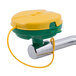 A green and yellow T&S counter mounted eyewash unit with a yellow handle.