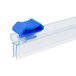A close-up of a blue plastic clip with a white background.