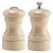 A Chef Specialties wooden pepper mill with a silver cap on a white background.