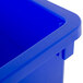 A close-up of a blue Continental rectangular wall hugger recycle bin with a lid.