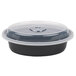 A black plastic Pactiv VERSAtainer oval container with a clear lid.