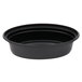 A close up of a black Pactiv VERSAtainer oval microwavable container with a black lid.