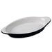 A white oval dish with a black rim and handle.