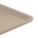 A close-up of a taupe Cambro dietary tray.